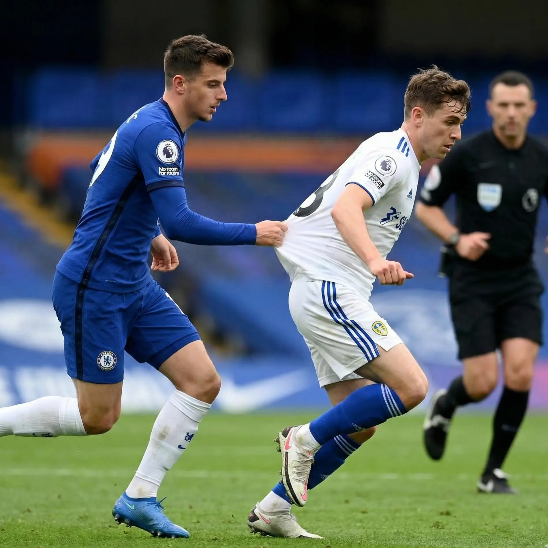 Midfielder making tactical foul to stop counter-attack